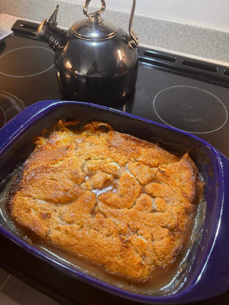 This image has an empty alt attribute; its file name is CHOPS-Peach-Cobbler-1-768x1024.jpg